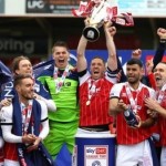 COMPETITION: Win a pair of tickets to Cheltenham Town FC v AFC Wimbledon on Saturday 19th March 2022